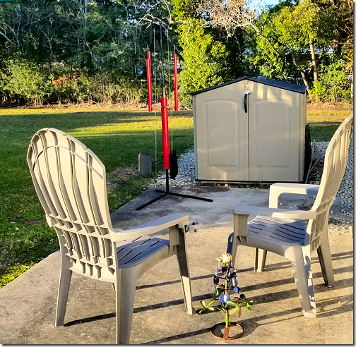 Patio with Chimes and Chairs